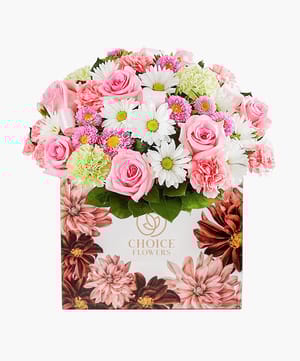 bright floral bag arrangement online flower delivery Dubai and Abu Dhabi