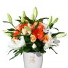 Orange and White Mixed Flowers in White Vase Zoom