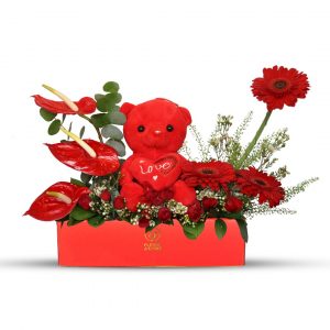 Red Flowers With Teddy in Red Vase